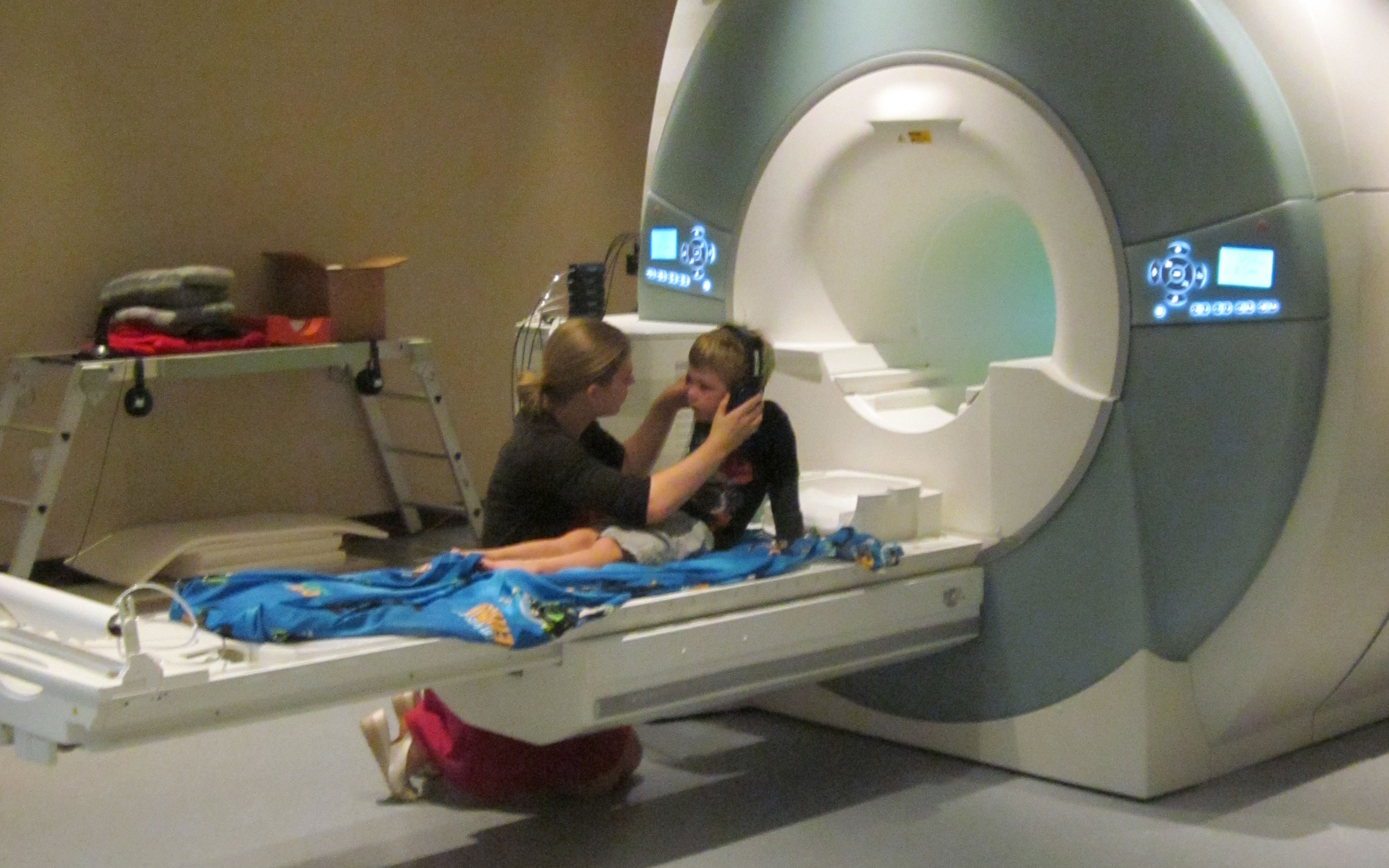 An MRI scan working with a subject who is a child